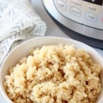 Bowl of cooked quinoa in front of Instant Pot