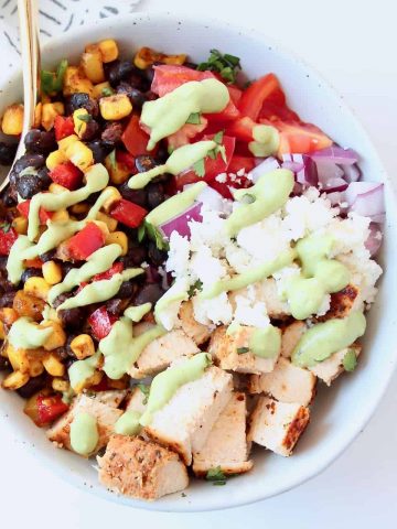 Overhead image of Tex Mex bowl with diced chicken, black beans, tomatoes and cheese