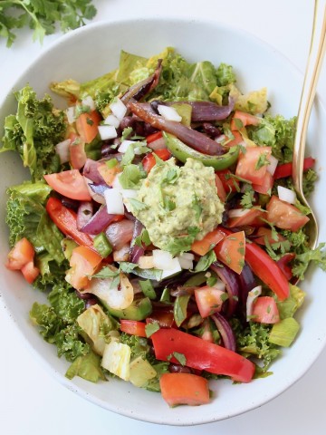 Overhead image of veggie fajita salad in bowl