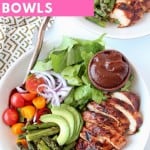 Sliced bbq chicken in bowl with vegetables