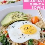 Sunny side up egg in bowl with quinoa, avocado and tomatoes