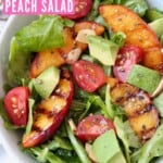 Overhead image of grilled peach salad in bowl
