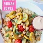 Overhead image of roasted vegetables and quinoa in bowl with fork