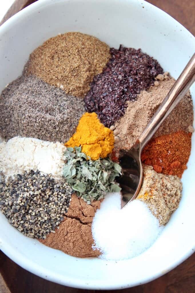 overhead images of spices in bowl with spoon