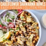 overhead image of two cauliflower shawarma bowls with tahini sauce in a small bowl on the side