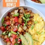roasted diced potatoes in bowl with scrambled eggs and sliced avocado