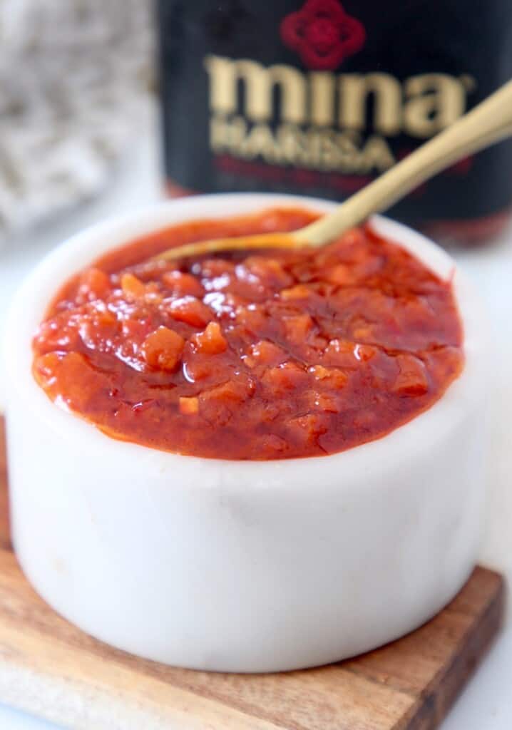 harissa sauce in small bowl with spoon