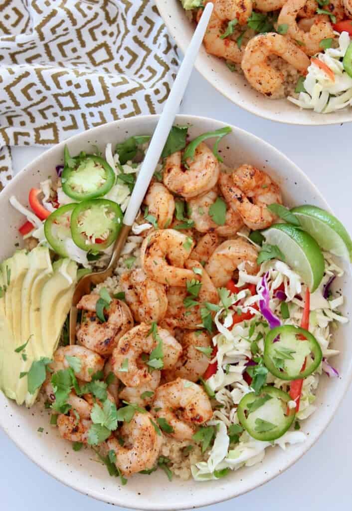 grilled shrimp in bowl with toppings
