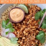 cooked tofu crumbles in bowl with sliced avocado, radish and cilantro