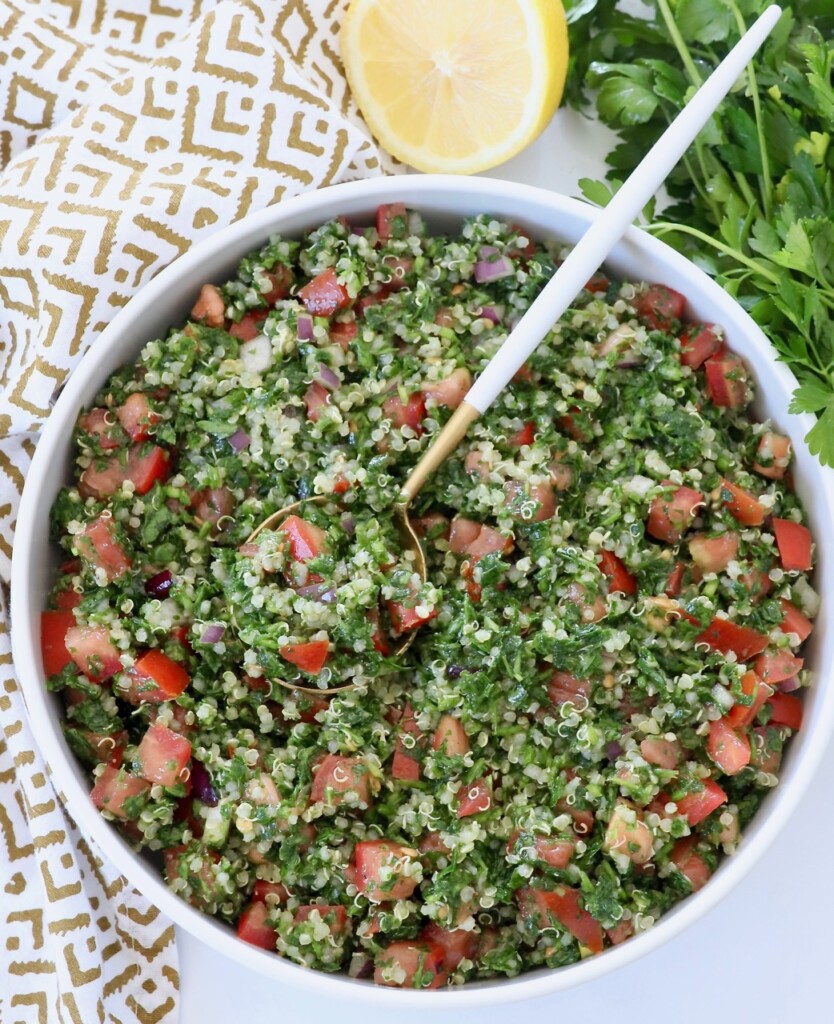tabouli salad in bowl with spoon