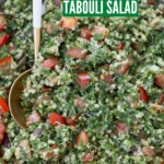 quinoa tabouli salad in bowl with spoon