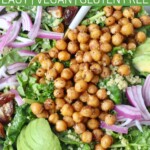 roasted chickpeas on salad in bowl with fork