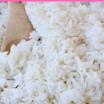 cooked coconut rice in bowl with spoon