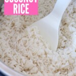 cooked coconut rice in Instant Pot with serving spoon