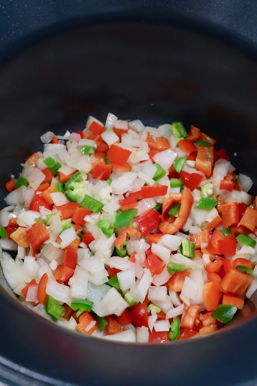 diced vegetables in pot on stove